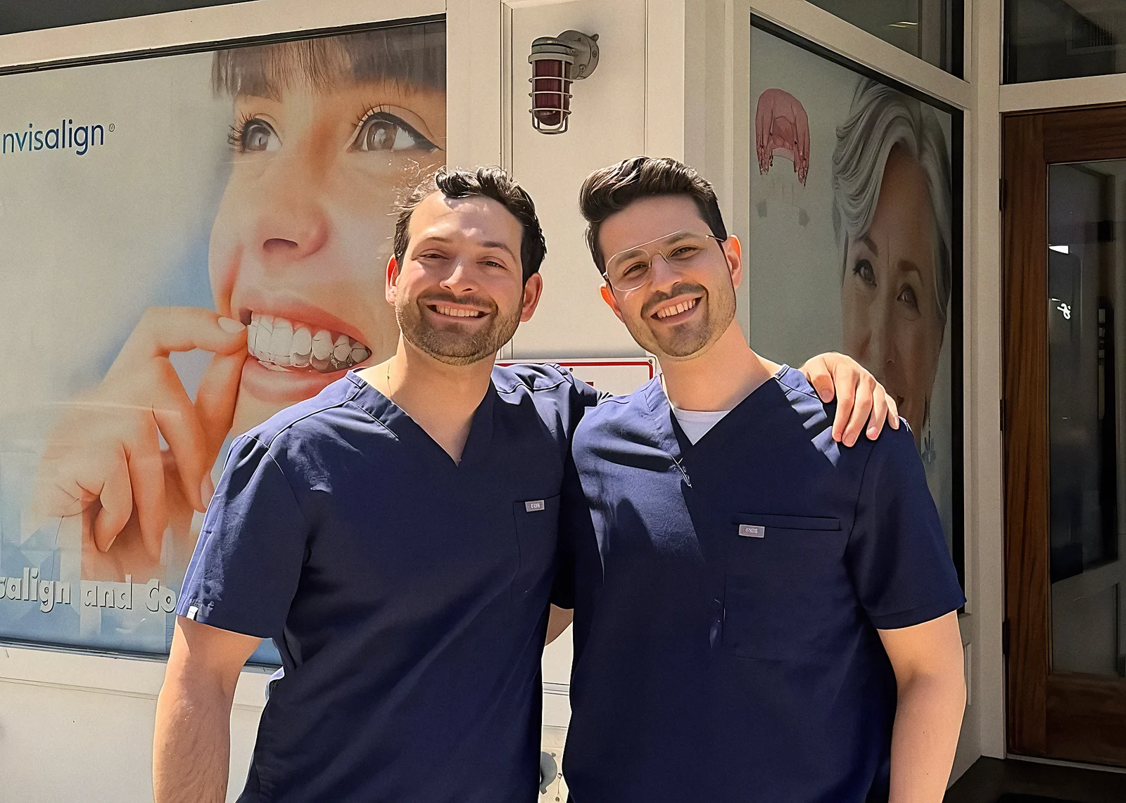 Dr. Alan Meskin and a colleague outside the practice