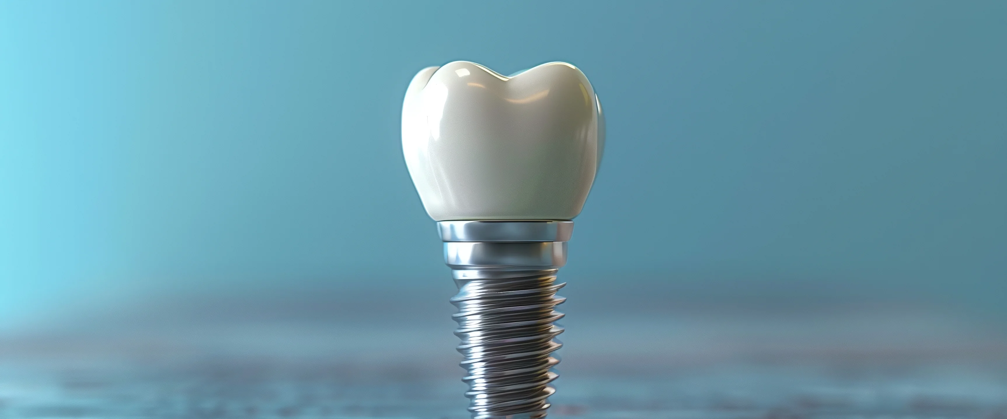 A dental implant with its crown, standing on a blue surface